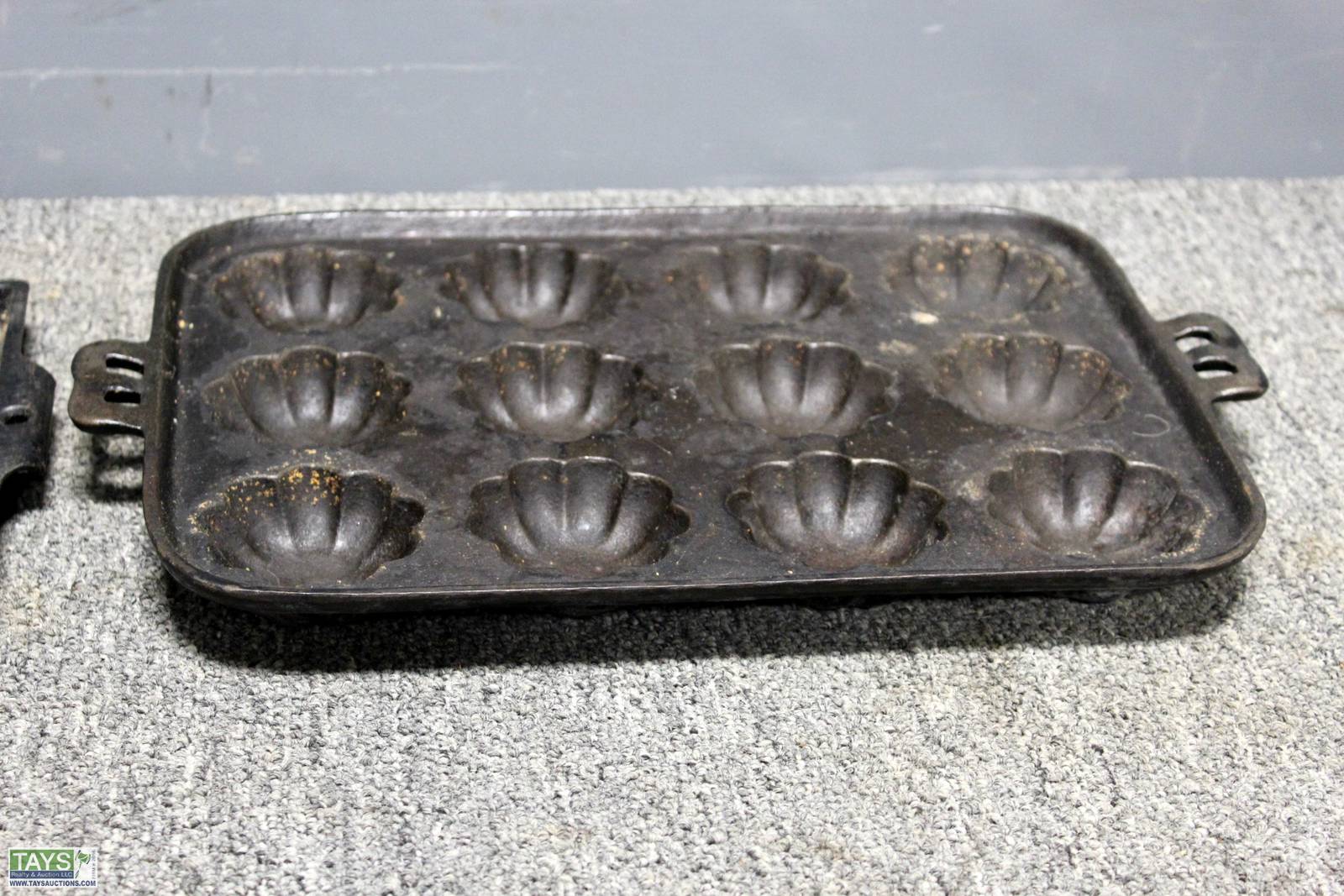 Sold at Auction: Cast Iron Muffin Pan