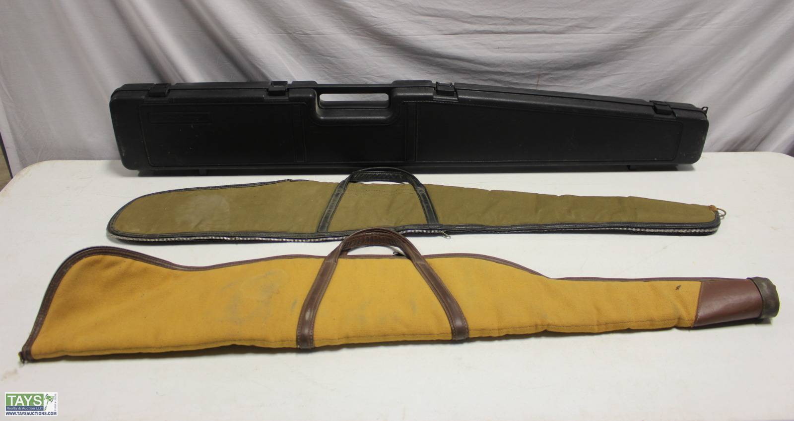 Tays Realty & Auction - Auction: ONLINE ABSOLUTE AUCTION: FURNITURE -  CHAMPION SAFE - ART PRINTS - POTTERY ITEM: Two Soft Sleeve and One Hard  Plastic Gun Cases