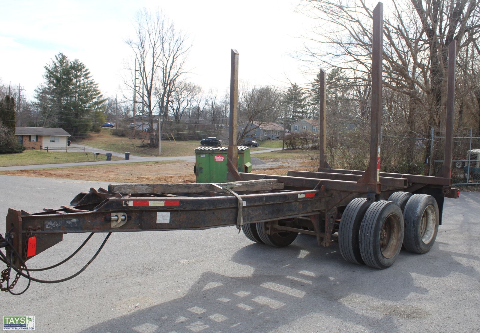 Tays Realty & Auction - Auction: ONLINE ABSOLUTE AUCTION: SEMIS - SPREADERS  - HAY EQUIPMENT - TRAILERS - ATVS - VEHICLES ITEM: 22' Pintle Hitch Log  Trailer